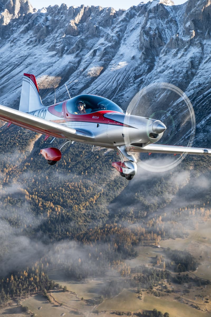 Bristell B23 in flight over the mountains