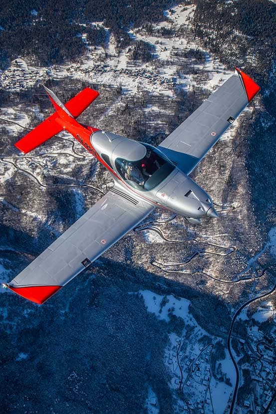 Top-down view of the Bristell B23 Turbo over a winter landscape