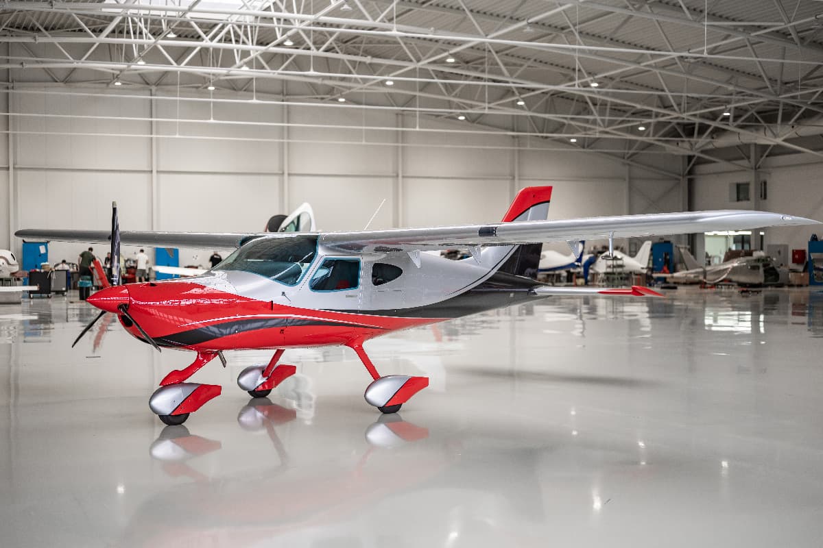 Bristell B8 all-metal airframe seen in profile in the hangar