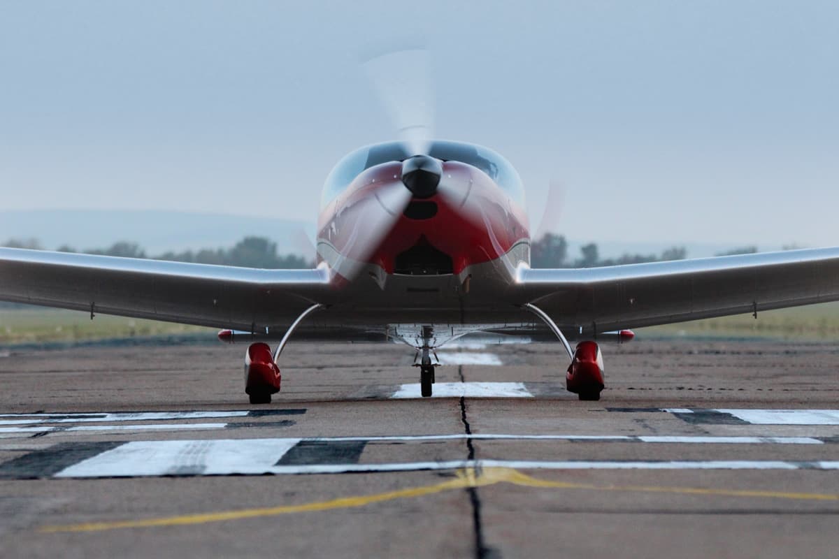 Bristell TDO head-on on the runway, taildragger stance