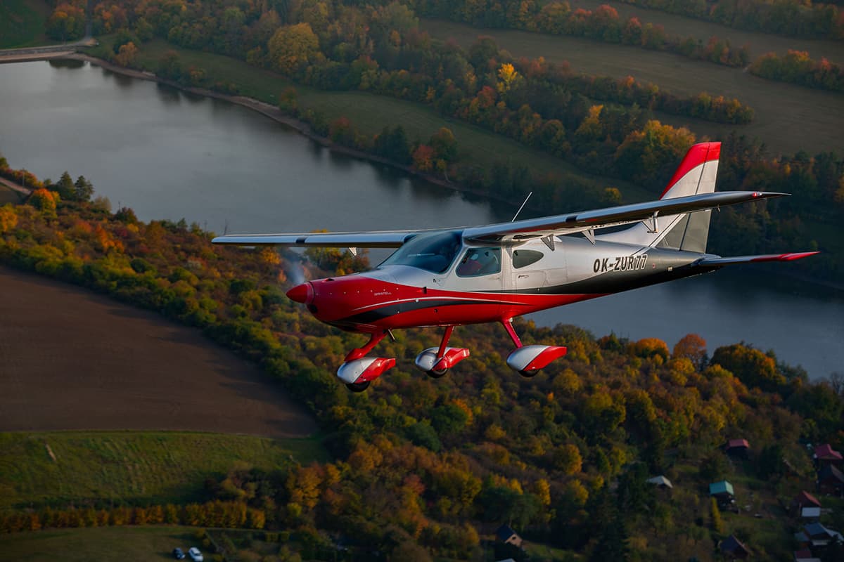 Bristell B8M in flight showing its fixed tricycle landing gear